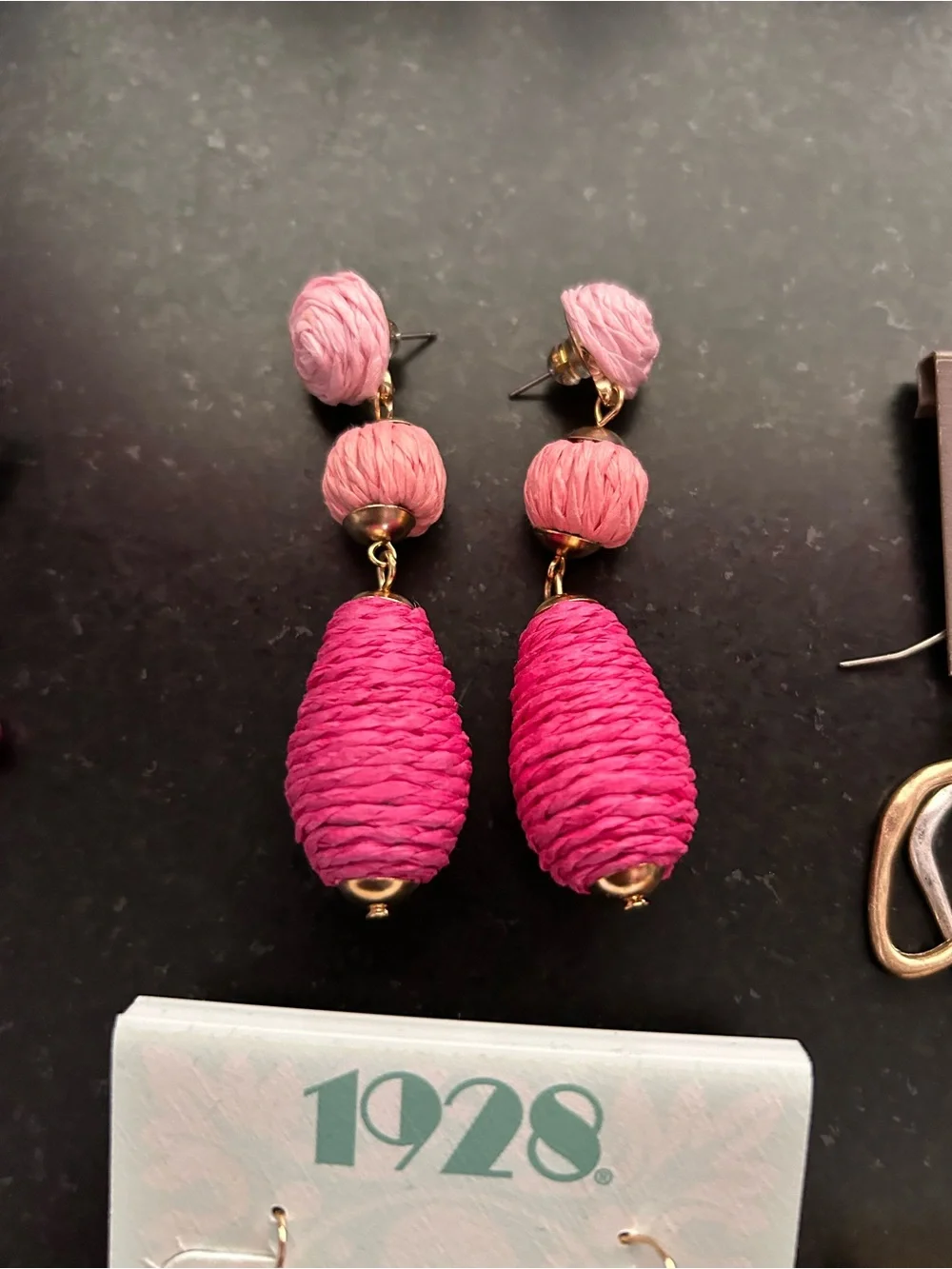 7 pair pierced earrings, drop style, most never worn, gold tone metals.